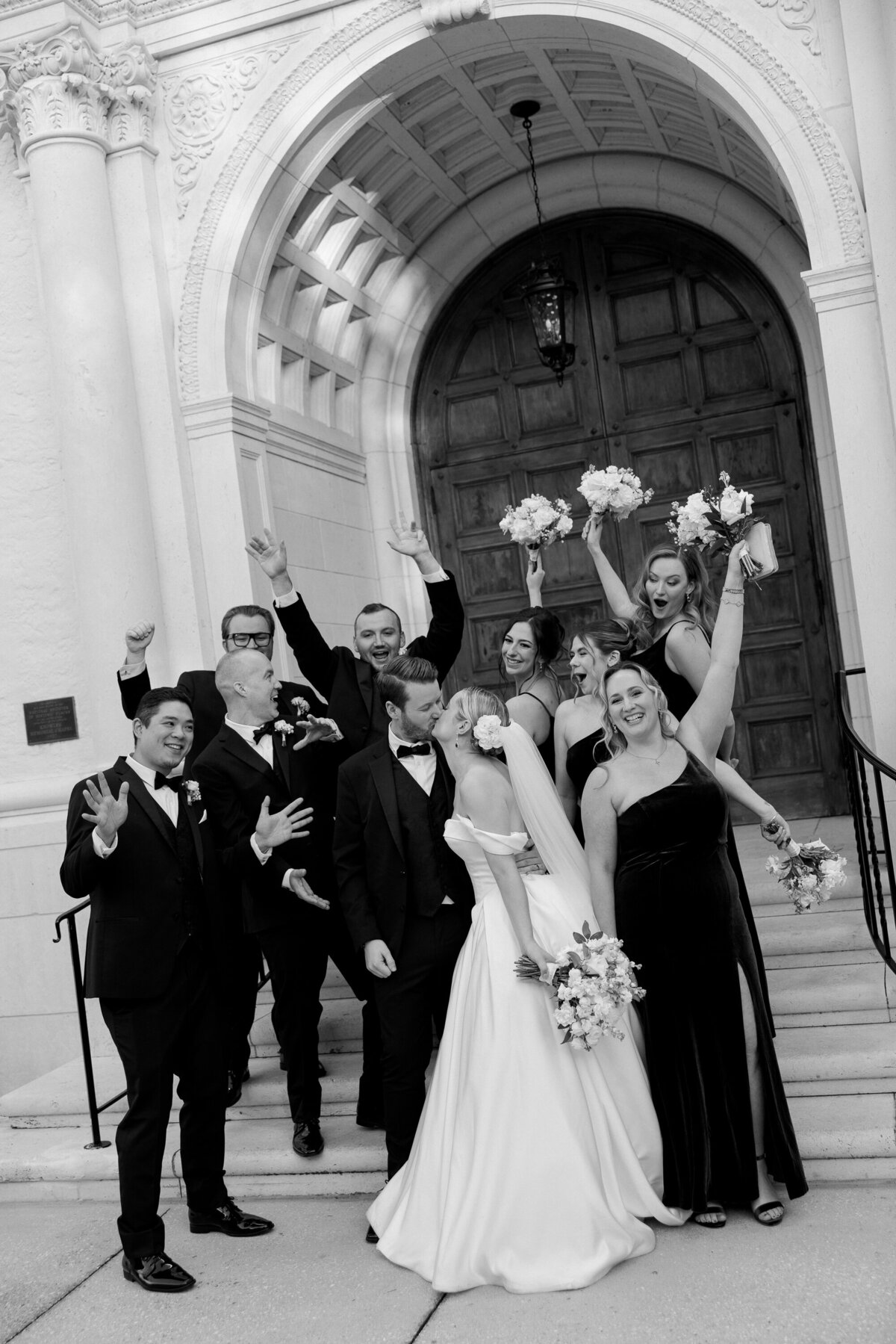 Fun wedding party portrait at The Grand Bohemian Orlando captured by a wedding and elopement photographer