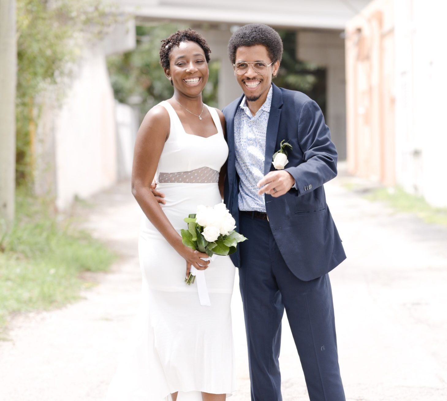 Bride & Groom standing together on a pathway in Key Largo, Florida