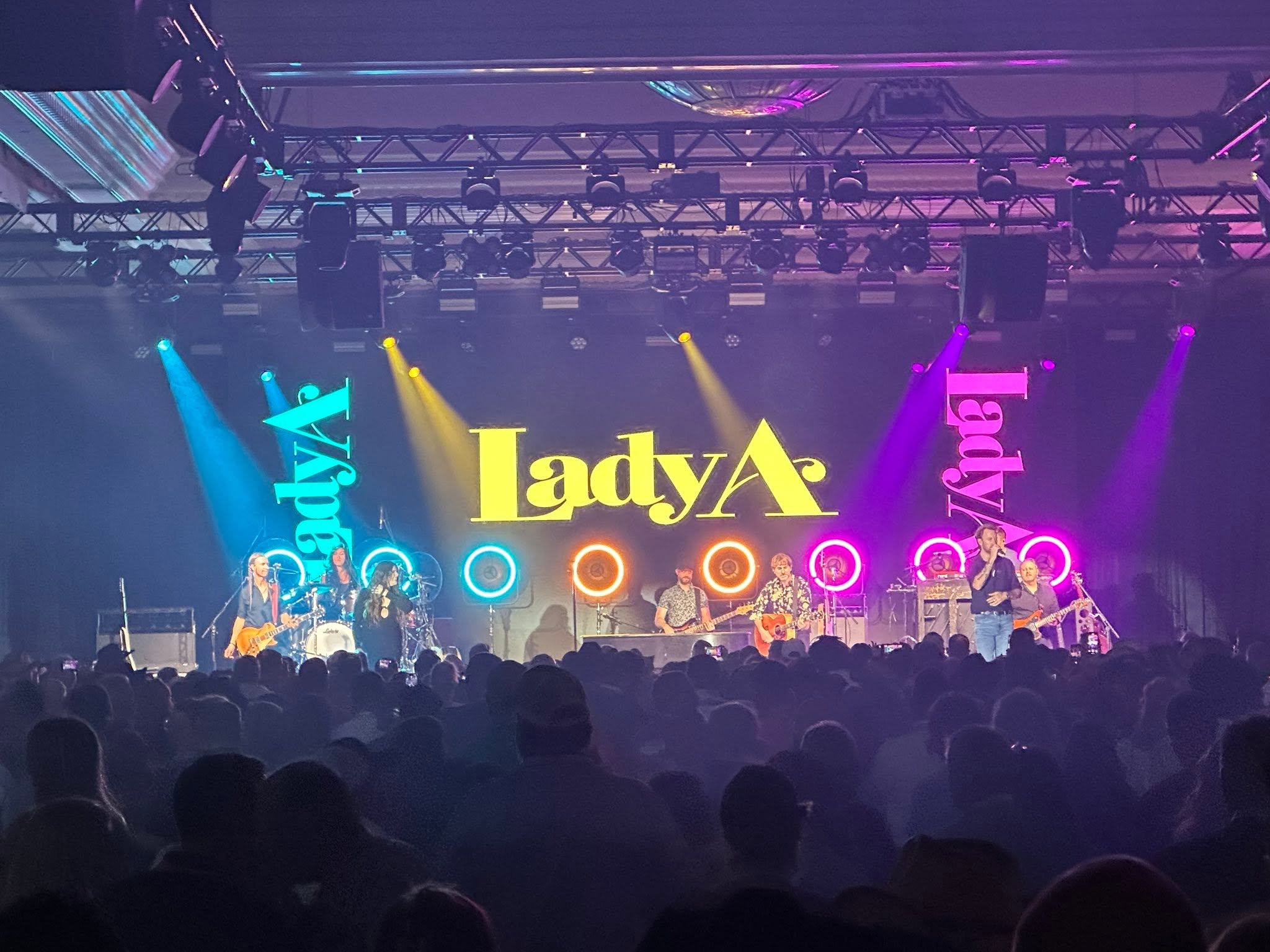 Lady A concert stage with colorful LED video displays and lighting production
