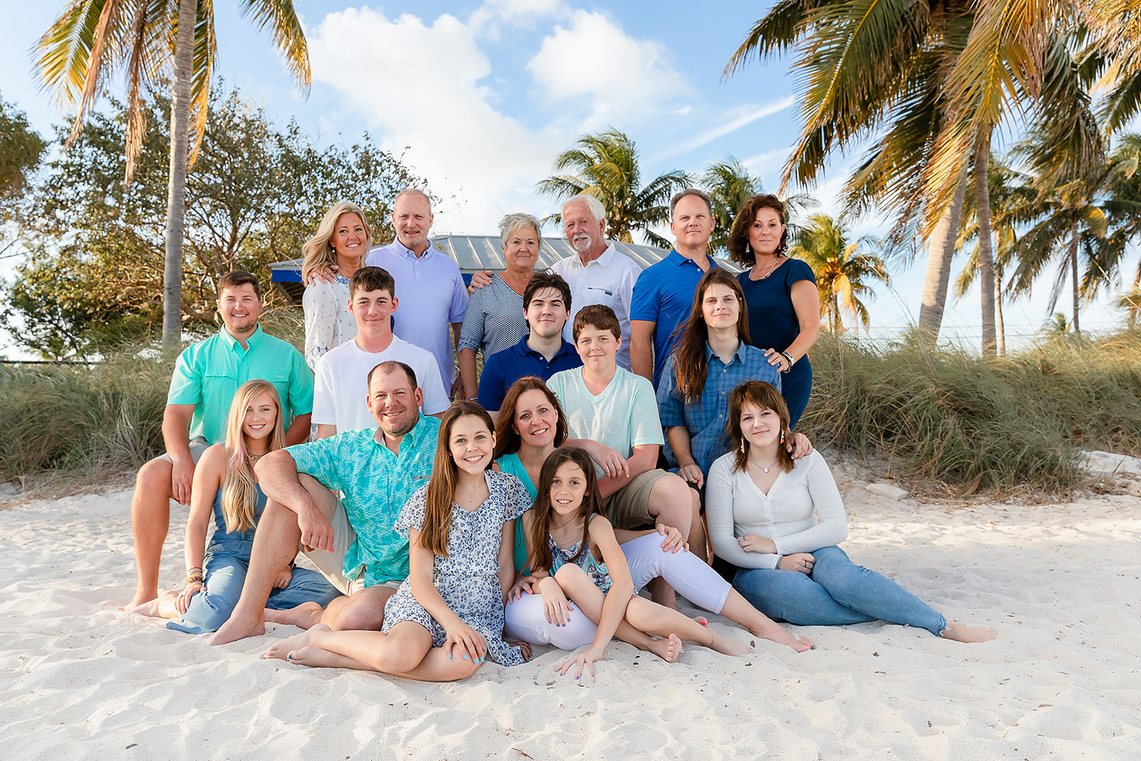 Family sitting photo on Sombrero beach Maraton
