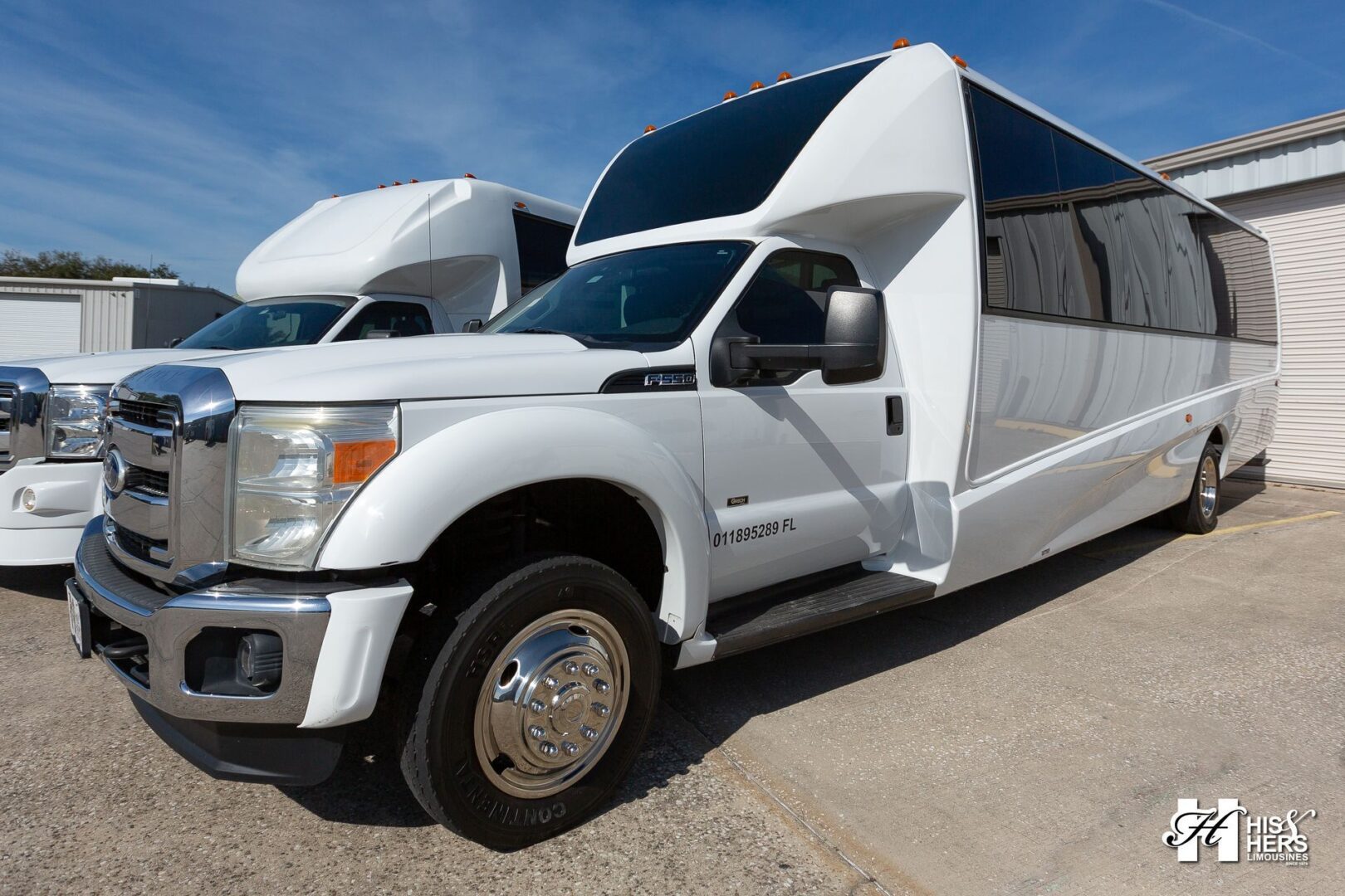 Large white limousine front view
