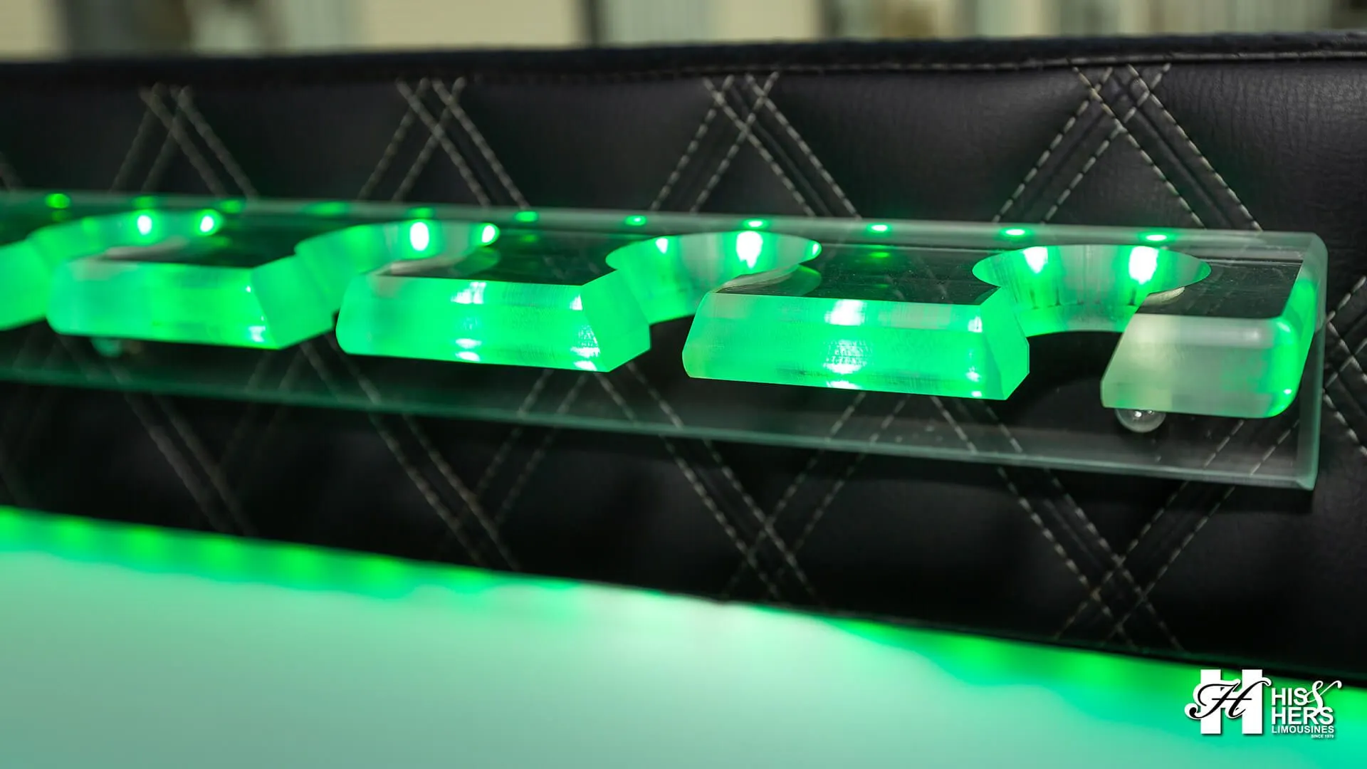 Illuminated acrylic panel with green glow