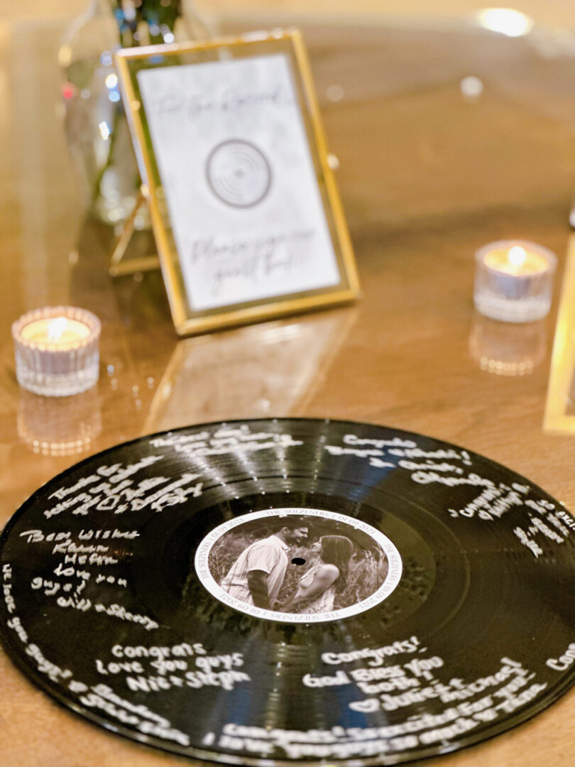 A record with the picture of a young couple on it.