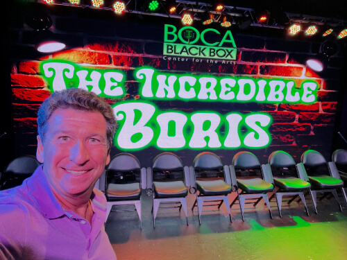 Comedy hypnotist Boris Cherniak on stage
