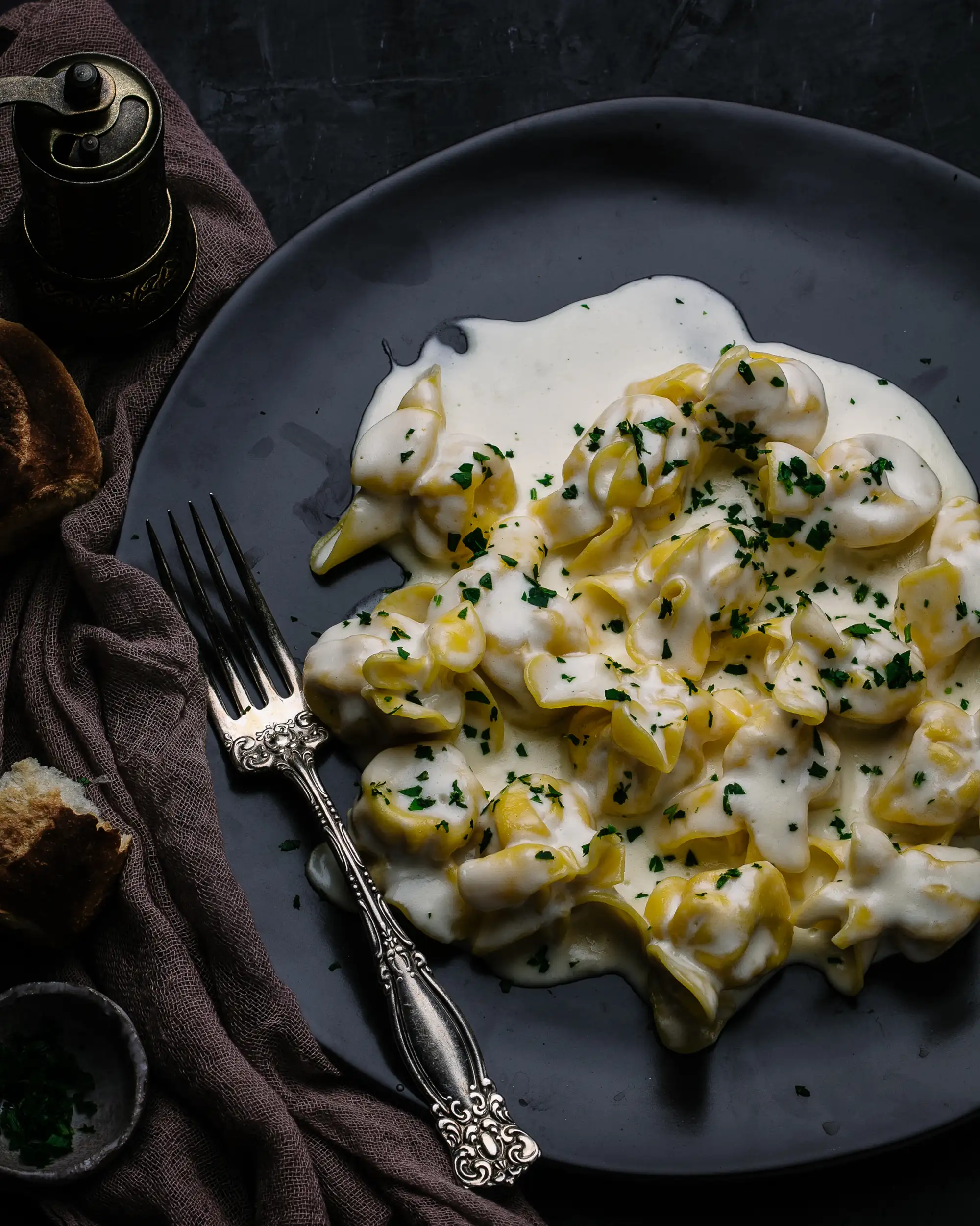 Gnocchi in a cream sauce topped with fresh herbs