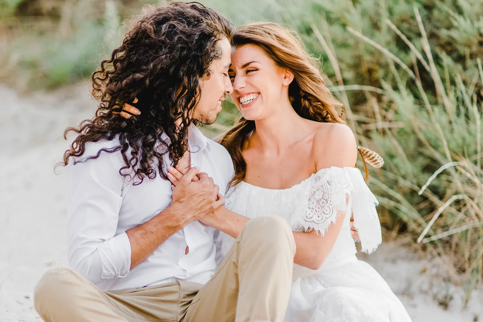 A closeup of the bridal couple's faces, looking at each other