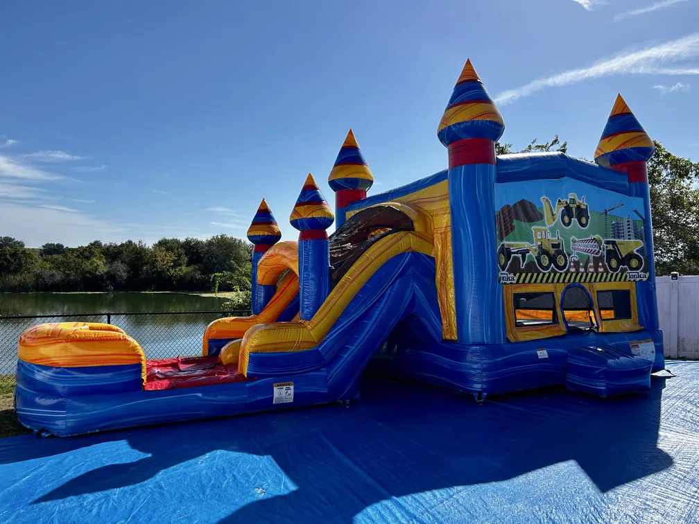 Tonka themed combo bounce house with slide rental in Lakeland, FL