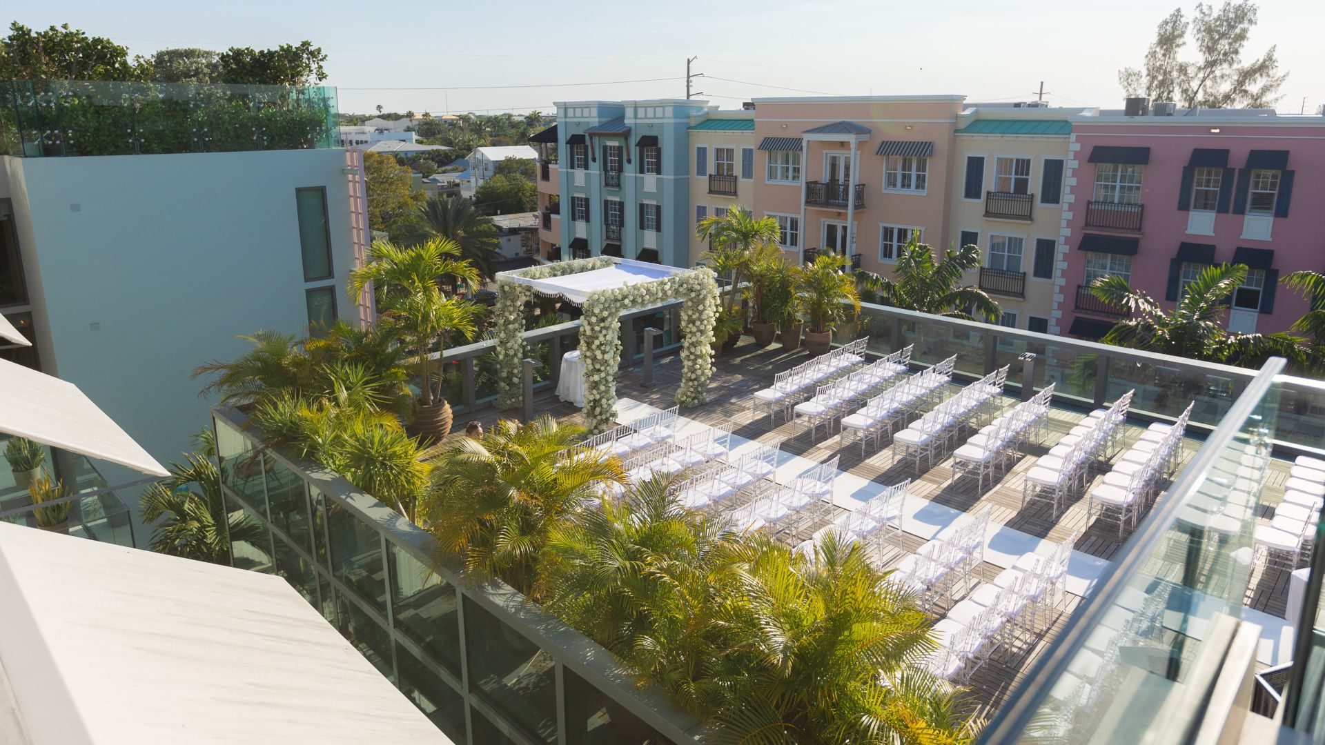 A Group Of Buildings With A Pool