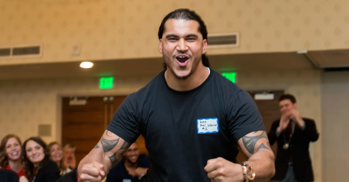 Dinner Detective Strong Man Flexing During Show