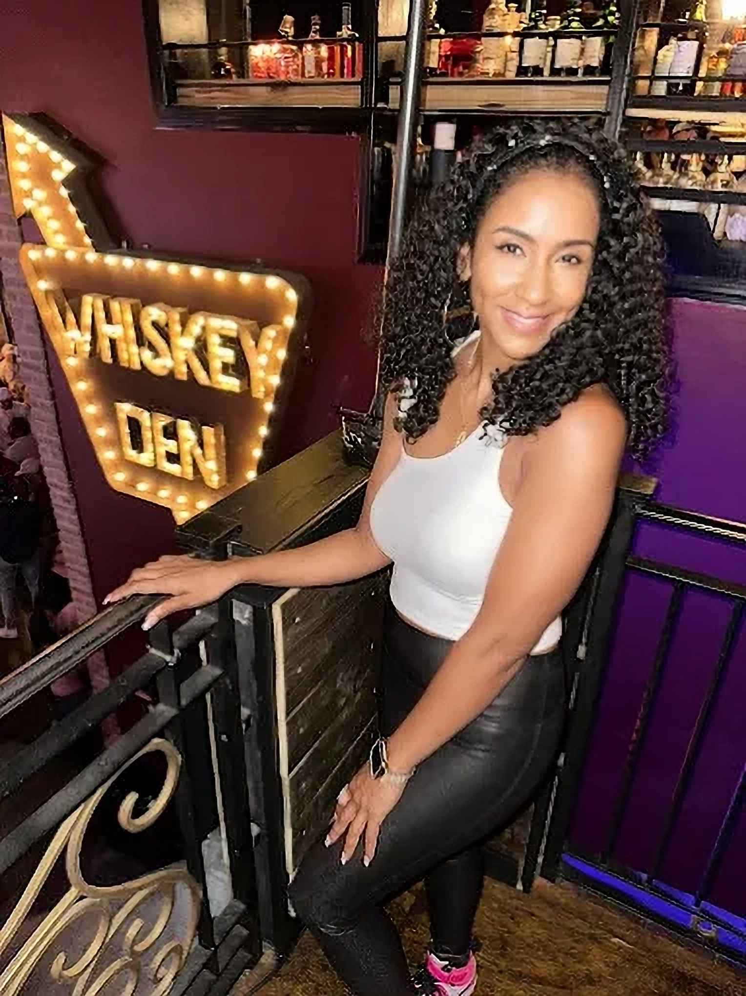 DJ Summer Boogie posing at a club