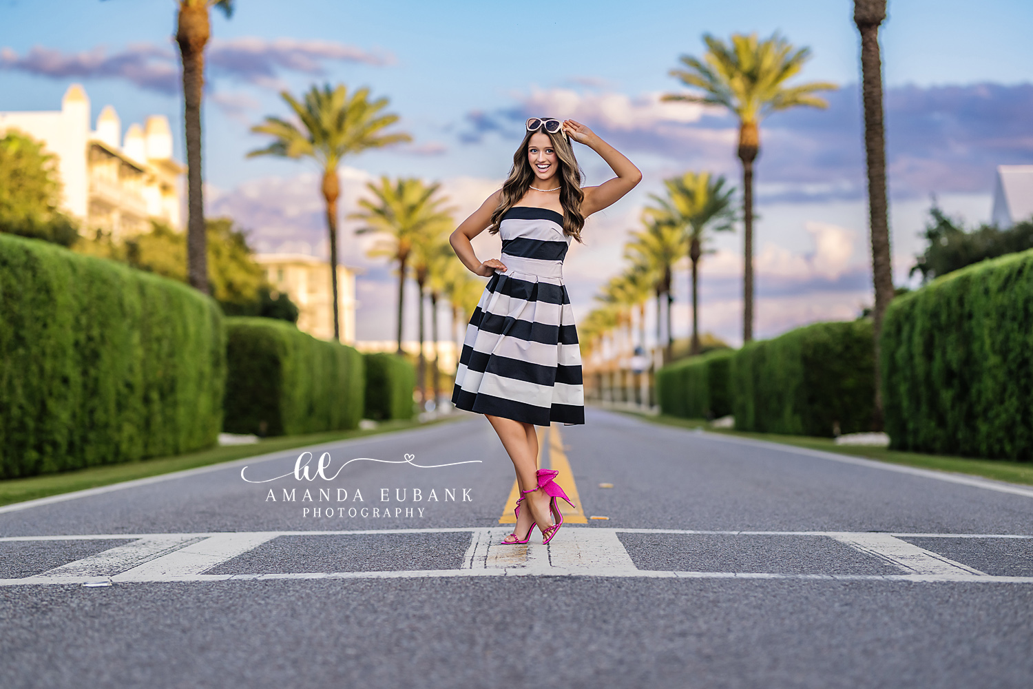 Alys Beach senior portrait photographer captures black-and-white sunset session beneath the palms in Alys Beach, FL